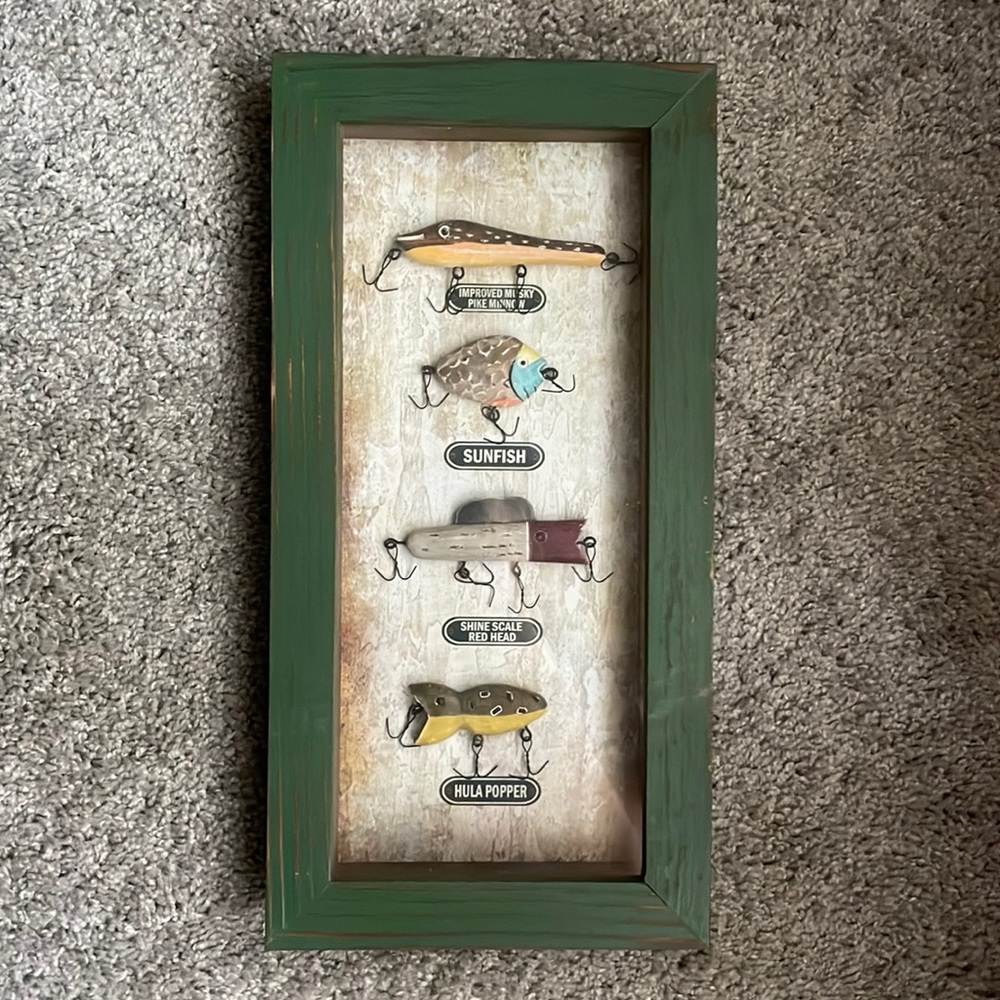 Wall pictures frame with wooden hooks displayed